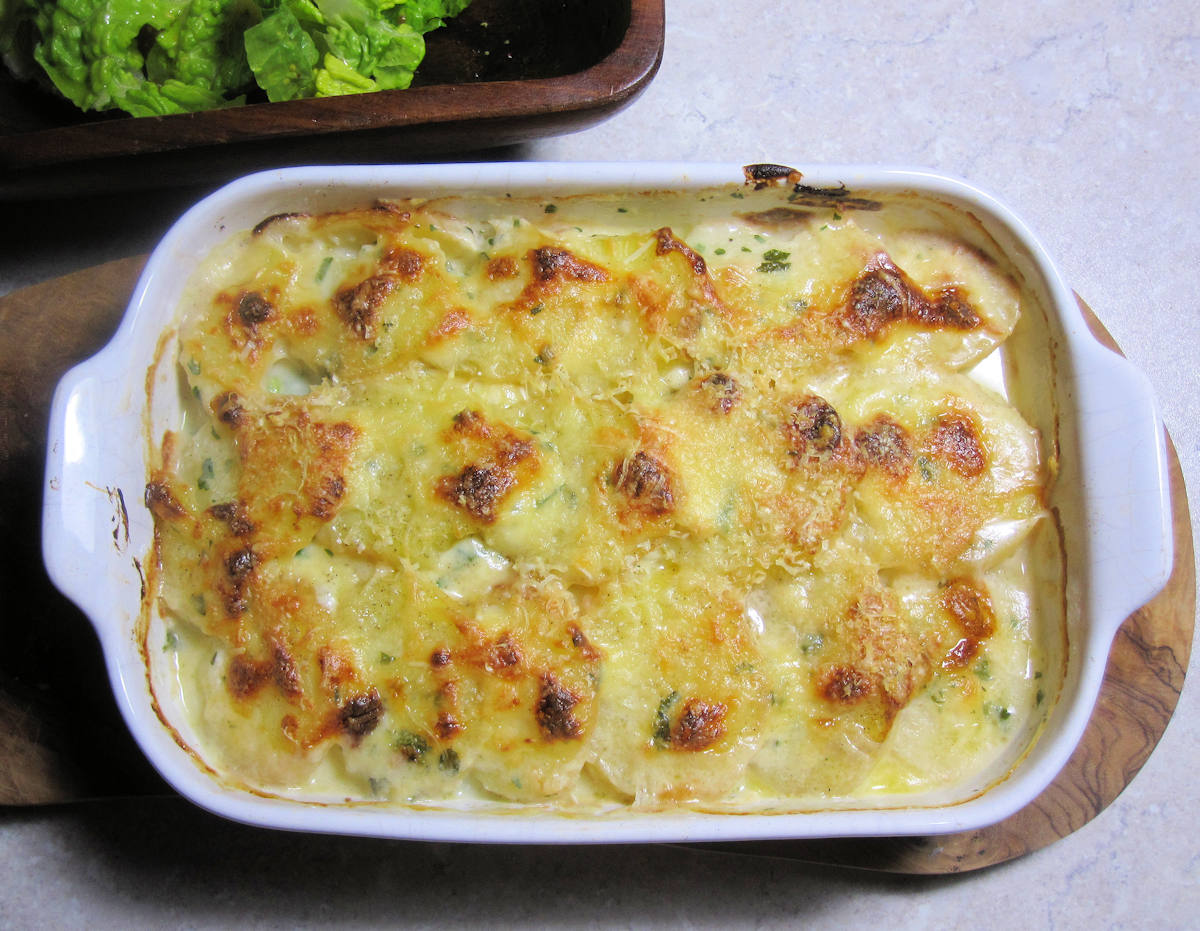 fish pie with sliced potato topping cuisinefiend.com