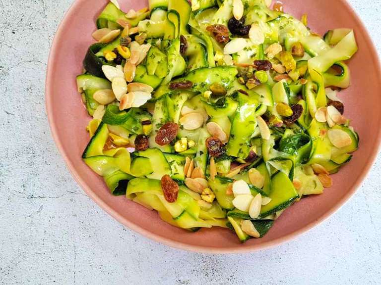 raw salad of courgette ribbons with almonds and raisins cuisinefiend.com