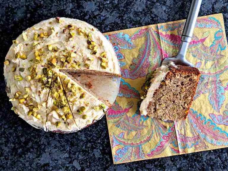 hummingbird cake with apple buttercream and pistachios cuisinefiend.com