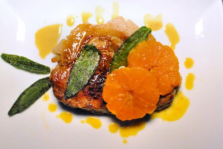 Pork steak with clementines and sage