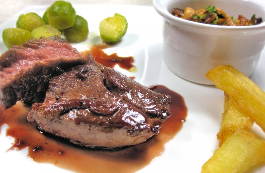 Venison steak in red wine sauce