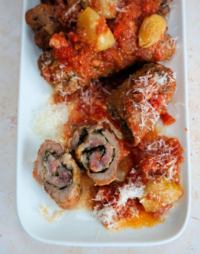 pork braciole in tomato sauce cuisinefiend.com